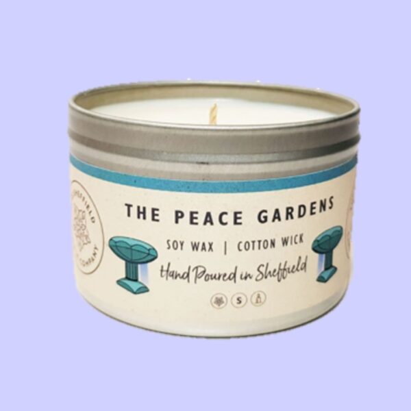handmade soy wax candle in tin with scent of sheffield's peace gardens