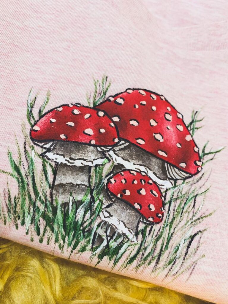 pink tshirt with 3 hand painted red mushrooms