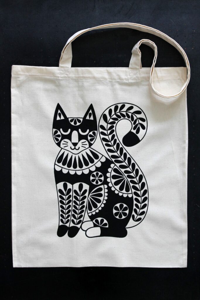natural white cotton tote with large black folkart style screen printed cat