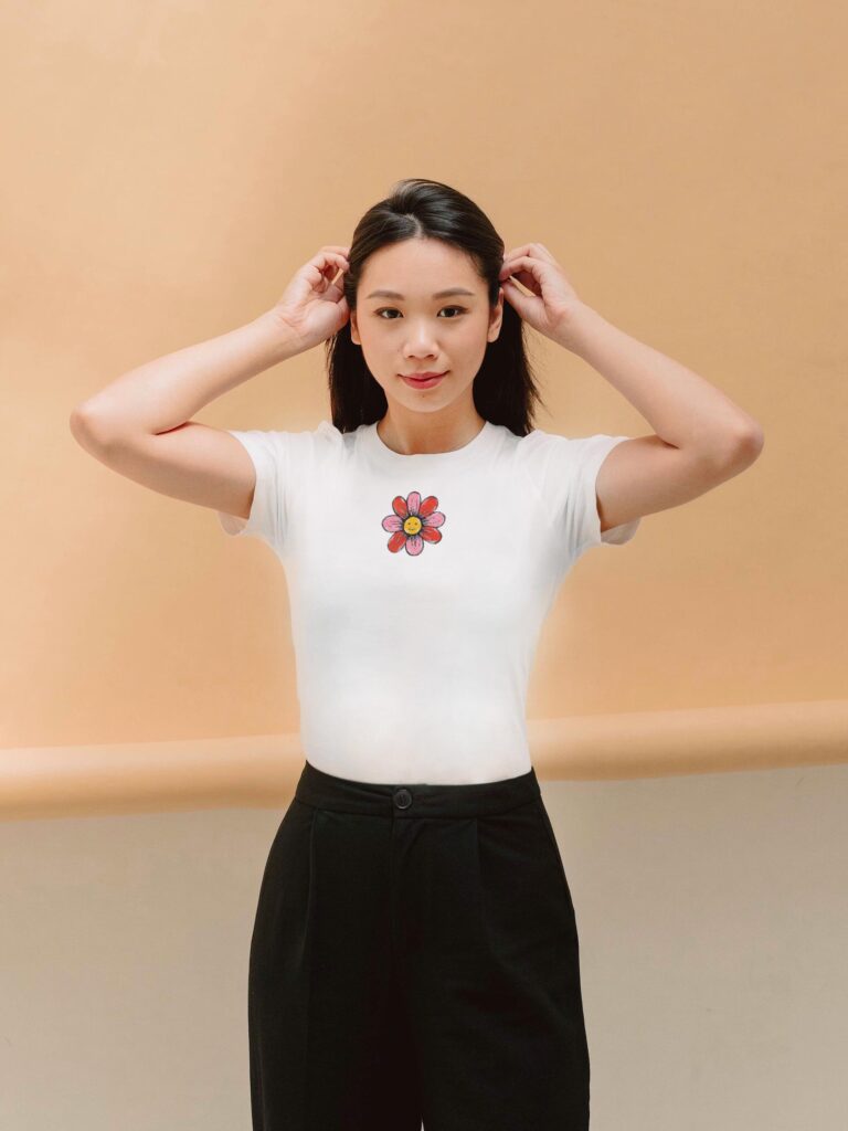 white t shirt with hand painted red and pink flower