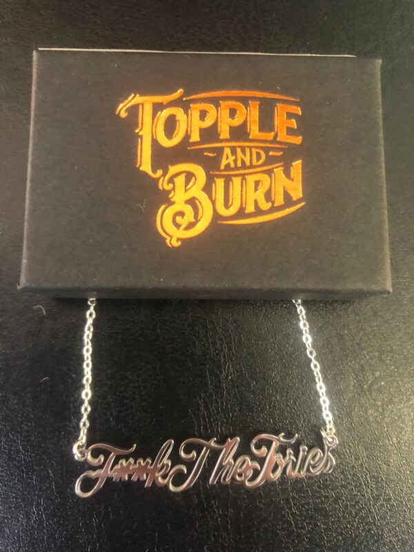 silver toned necklace with censored fuck the tories wording from Topple and Burn